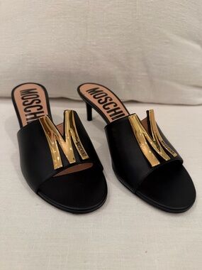 Moschino Black Slide Mules with Gold M Emblem